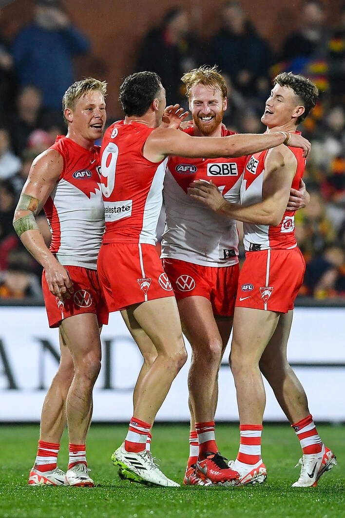 Swans surge towards finals as Crows' season comes to an end