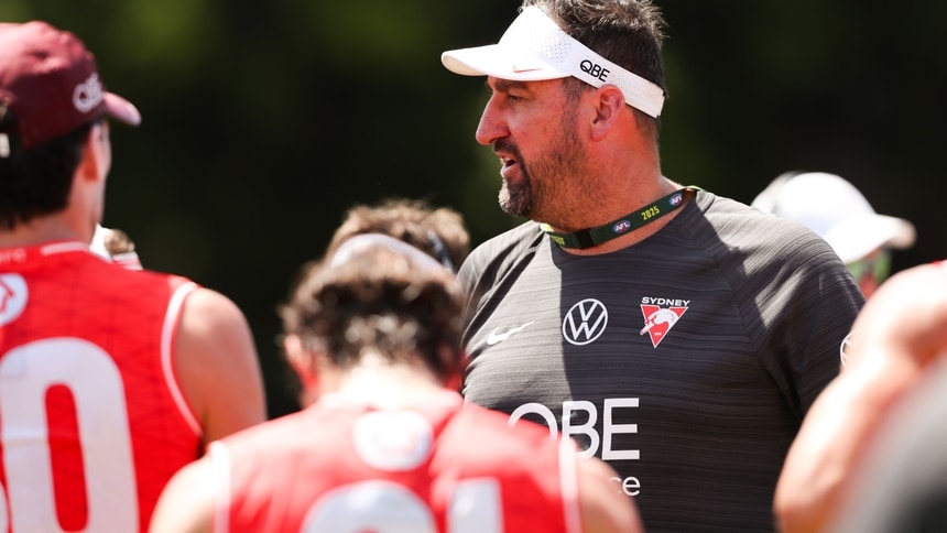 Dean Cox speaks to playing group